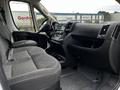 Interior view of a 2018 RAM Promaster showing two front seats dashboard and steering wheel