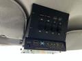Control panel for Star Warning Systems with various switches and indicators mounted on a vehicle ceiling