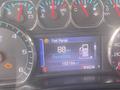 Dashboard display of a 2015 Chevrolet Silverado 3500HD showing fuel range of 88 kilometers and total distance of 155184 kilometers