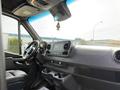 Interior view of a 2019 Mercedes-Benz Sprinter showing the driver's seat dashboard and infotainment system