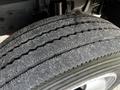 Close-up of a tire from a 2019 Hino 195 showing tread patterns and surface wear