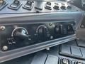 Dashboard controls of a 2022 Blue Bird Vision including knobs for passenger, driver, bus, defrost settings and a switch for repair
