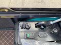 Control panel of a 2024 AGT Industrial QH13R Mini Excavator featuring switches and a large adjustment knob