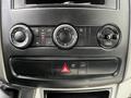 Climate control and controls of a 2012 Mercedes-Benz Sprinter including knobs for temperature and air conditioning