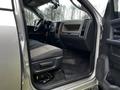 Interior view of a 2012 RAM 3500 showing the driver's seat dashboard and floor mats