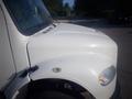 A white 2016 Freightliner M2 106 Medium Duty truck with a smooth hood and prominent headlights visible in the foreground