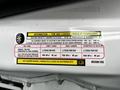 Tire and loading information sticker on a 2021 RAM Promaster providing details on seating capacity and tire pressure requirements