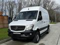 2017 Mercedes-Benz Sprinter van in white with a boxy shape and a black front grille parked on a paved surface