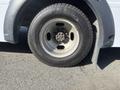 Close-up of a tire mounted on a 2017 Chevrolet Express showing the rim and tire tread details