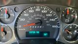 Speedometer and dashboard gauges of a 2011 Chevrolet Express displaying 10726 km and a temperature of 16 degrees