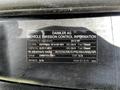 2012 Mercedes-Benz Sprinter with a vehicle emission control information label detailing compliance and specifications