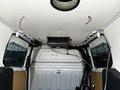 Interior view of a 2016 Ford Transit Connect showing the cargo area with exposed wiring and empty walls