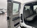 A 2017 Ford F-250 SD with the rear door open revealing spacious grey seating in the interior