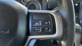 Close-up of steering wheel controls for cruise control on a 2019 RAM 3500 featuring buttons for cancel res plus and set