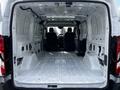 Interior view of a 2018 Ford Transit van showing a spacious cargo area with a flat floor and no installed seating