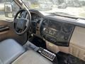 Interior view of a 2008 Ford F-450 SD showing the steering wheel dashboard and controls