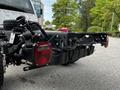 A 2024 Ford F-550 chassis with visible rear lights and towing equipment designed for heavy-duty performance and utility