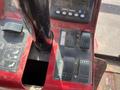 Close-up of the control panel of a 2014 Toro Groundmaster 5910 featuring buttons levers and an information display with various icons and indicators