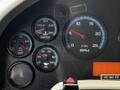 Dashboard of a 2017 International WorkStar 7600 showing gauges for water temperature oil pressure and RPM