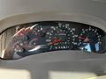 Dashboard of a 2000 Ford Motorhome displaying various gauges including speedometer fuel temperature and tachometer with dials and indicators