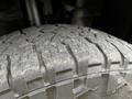 Close-up of a worn tire tread from a 2018 RAM Promaster showing distinct patterns and grooves