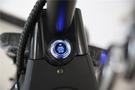 A close-up of the start-stop button on a Citycoco 2000W electric scooter featuring a circular blue light and sleek black design