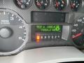 Instrument cluster of a 2009 Ford F-450 SD displaying trip mileage fuel level and gear selection