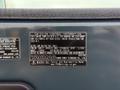 A black emission control information label featuring technical specifications for a 2022 Hyundai R55-9A diesel engine