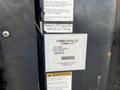 A label attached to a 2008 Mitsubishi Fuso FE180 truck featuring specifications and a warning related to a Tommy Lift system
