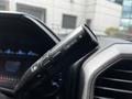 The image shows the tow/haul control switch on the steering column of a 2017 Ford F-250