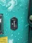 A close-up of the hour meter on a 2024 AGT Industrial MH12R Mini Excavator displaying the operating hours and a wet surface with water droplets