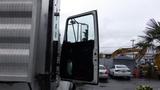 A 2019 Western Star Trucks 4900 with the driver's side door open showcasing the interior details of the truck