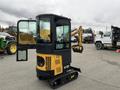 2024 AGT Industrial Yellow H13R Mini Excavator with a cab open showcasing controls and arm attachment