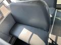 A single gray bus seat designed for a Blue Bird Vision with a flat cushion and a sturdy backrest