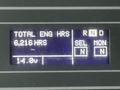 Display panel of a 2020 International MV607 showing total engine hours as 6216 and battery voltage at 14.0 volts