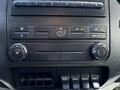 Dashboard controls of a 2016 Ford F-750 featuring climate control dials and buttons for air conditioning and fan settings