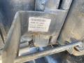 2006 Komatsu PC55MR2 machinery with a visible serial number plate attached to it