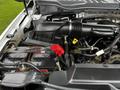 Close-up of the engine compartment of a 2017 Ford F-550 highlighting the air intake system and battery with visible cables and components