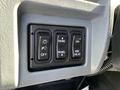 Close-up of control panel featuring four buttons labeled P OFF PANEL ON and MIR HEAT on a 2007 International 7300 vehicle interior