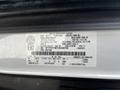 A 2018 Ford Transit vehicle showing the manufacturer's label with specifications including weight and vehicle identification number