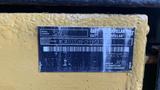 A yellow identification plate for a 2018 Caterpillar 326F L Excavator displaying model number and product identification number