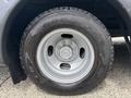 Close-up of a silver wheel with a Goodyear tire on a 2020 Chevrolet Express showing the wheel hub and tire tread