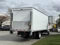 A 2017 Hino 338 truck with a box-style cargo area visible from the rear