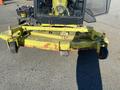 A yellow and green Kubota F3680 lawn mower with a large cutting deck and wheels visible in the front