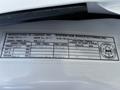 A white label with vehicle specifications and manufacturing details for a 2009 Ford F-550 including weight ratings and tire information