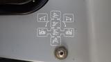 A diagram showing the control functions for a 2013 Komatsu D37PX-22 with icons representing different operations