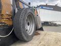 A 2017 Ford F-550 truck tire is prominently displayed with visible tread patterns and a silver alloy rim