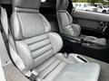 Interior seats of a 1992 Chevrolet Corvette featuring gray leather upholstery and a sleek design