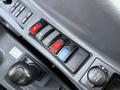 Control panel of a 2022 Hyundai R55-9A showing various buttons and switches for operation