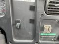 Interior panel of a 2007 Freightliner B2 showing switch for brake and a label indicating the vehicle is equipped with an antilock brake system